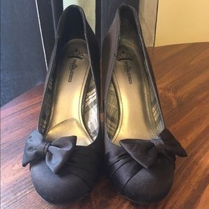 Fergalicious black high heels with bow accent