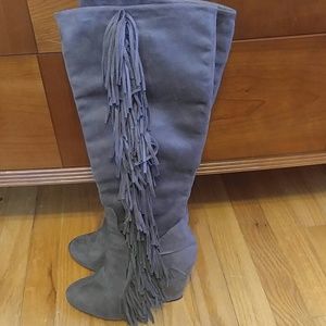 High tassel boots