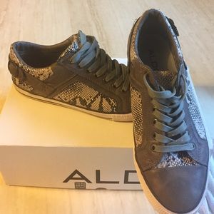 Also faux snake skin sneaker