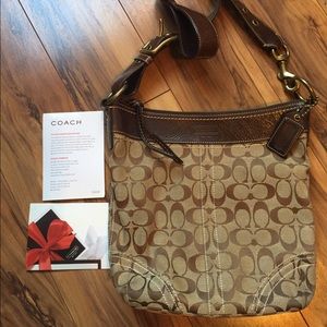 Authentic Signature Coach canvas & leather purse