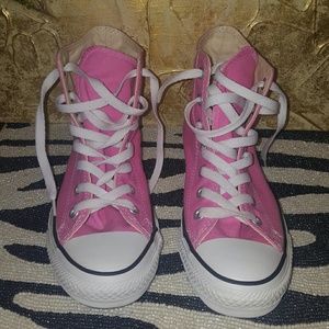 Bubblegum pink Converse hightop sneakers