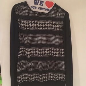 Dress shirt with classy back button closure.