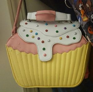 Iron fist bakers dozen cupcake purse