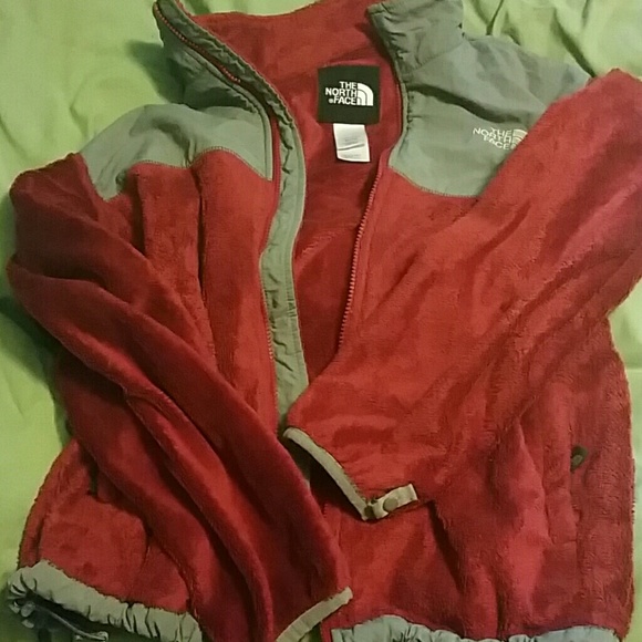 Gently used red fuzzy north face coat