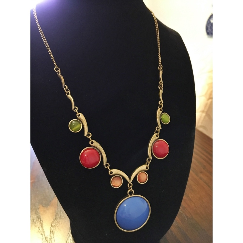 Colorful bronze necklace with jewel tone stone