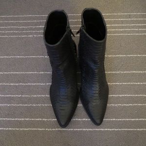 Heeled boots, never worn comes with box!
