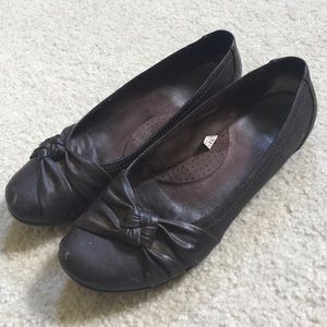 Brown flats, well loved