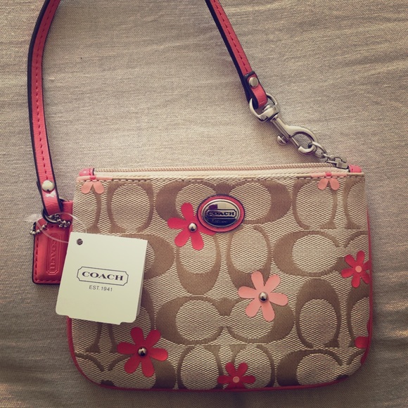 Coach floral wristlet brand new with tag.