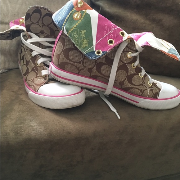 Hightop tan tennis shoes coach.