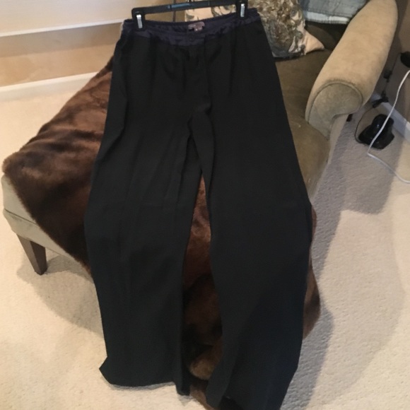 Vince silk pants with side pockets .