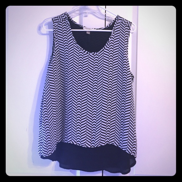 Black and white sleeveless top with faux open back