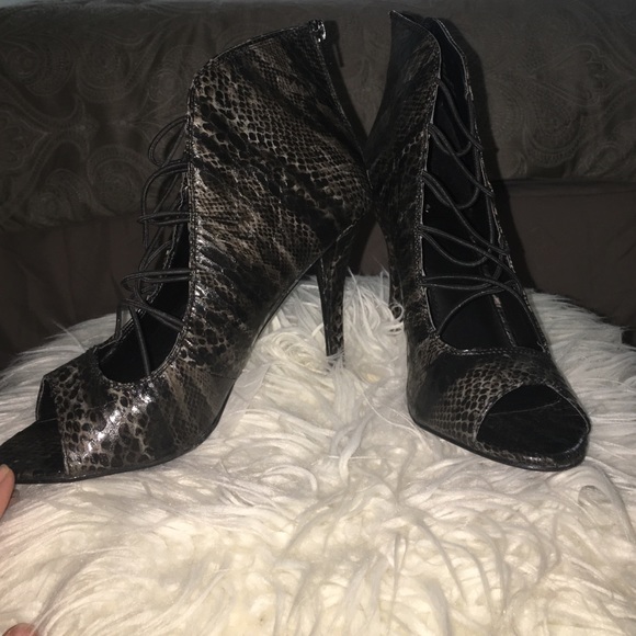 Mia size 10 animal print lace up sandals.