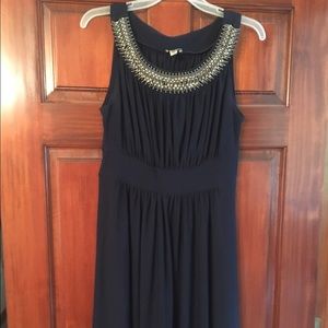 Semi-formal navy cocktail dress with beaded neck