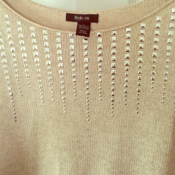 Sweater with metallic embellishments