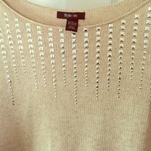 Sweater with metallic embellishments