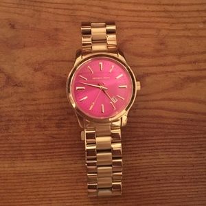 Michael Kors gold watch with pink face