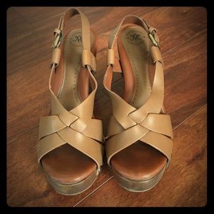 Toffee brown, heeled leather sandals.