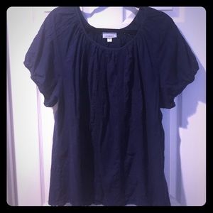 Short sleeve eyelet blouse.