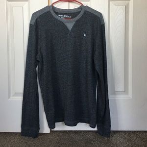 Dark gray Hurley sweater.