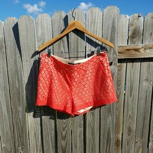 Lace overlay shorts in coral