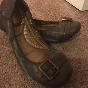 Brown and blueish green flats