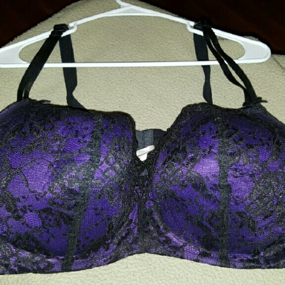 Very pretty cacique purple and black lace bra.