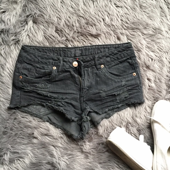 Black low rise distressed jeans