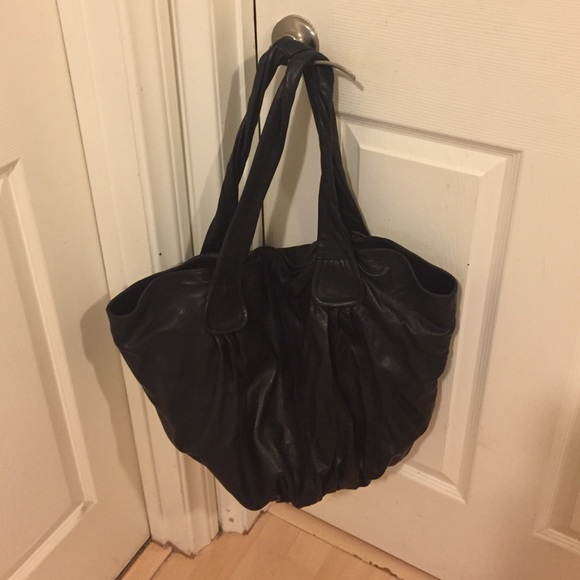 Black leather oversized hobo bag.