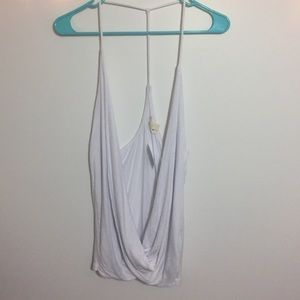 White low hanging top