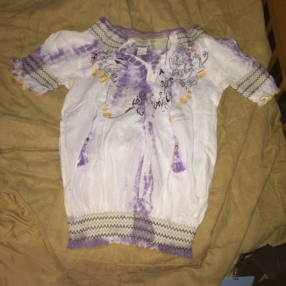 A 100% cotton shirt. With designs.