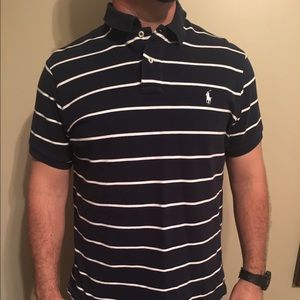 Navy polo with white stripes.