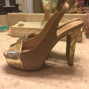 Size 7 peep toe platform heels by Paula Abdul