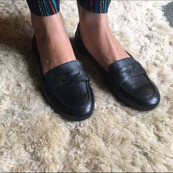 Low profile, minimal, black Born penny loafers