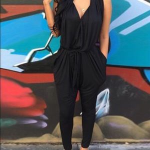 Black, one piece outfit.
