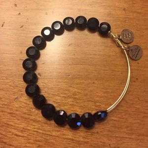 Black bracelet.  Alex and Ani
