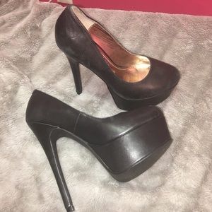 Gently used, black platform pumps