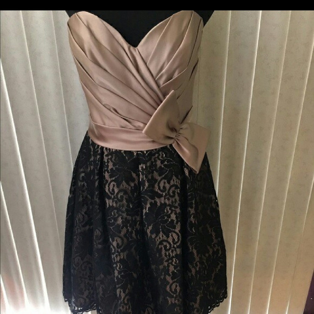 Beige and black dress