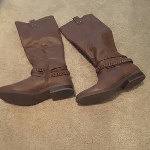 Below the knee high boots