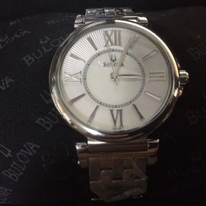Brand new Bulova watch. Still in box with papers.
