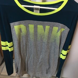 Pink sweatshirt have the pants to match.