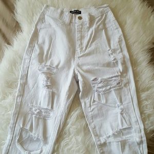 Distressed high waisted jean