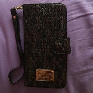 Brown Michael Kors folio phone case
