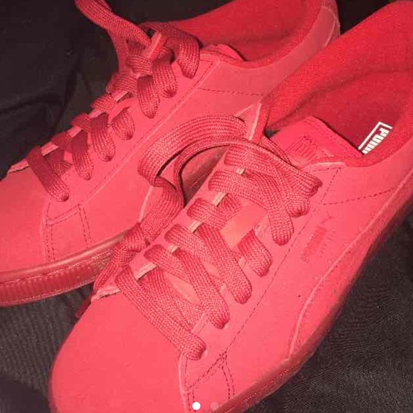 Red suede Pumas
