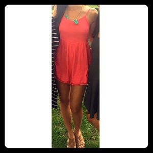 Coral Romper with PomPom detail