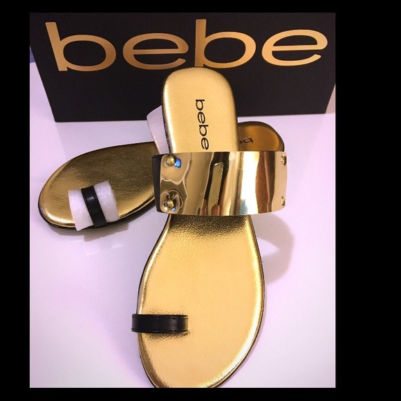BeBe Gold and Black Flats