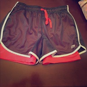 Athletic shorts with built in spandex layer