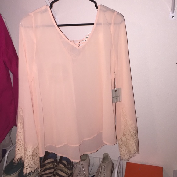 Shear long sleeve top