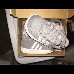 Grey and white adidas
