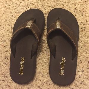 Brown flip flops