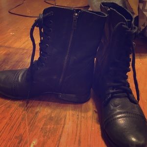 Black combat boots from Steve Madden